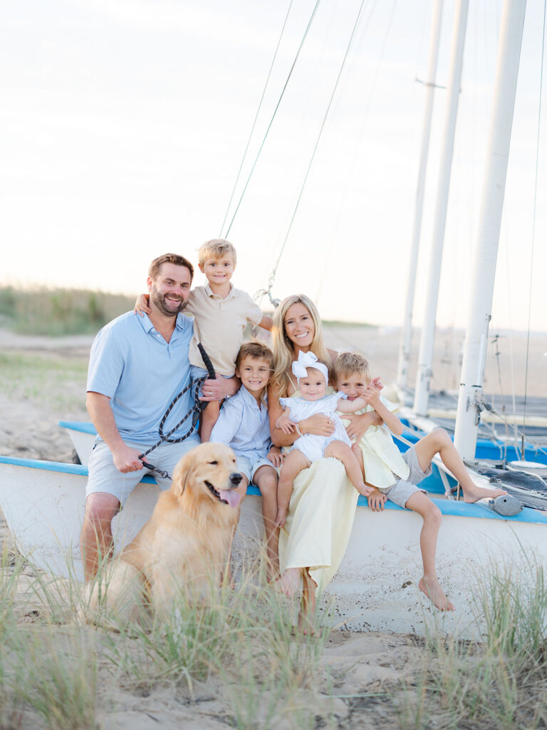 Family of six sitting on boat in Virginia Beach 